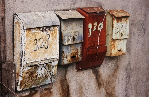 Russian mailboxes on the stucco wall